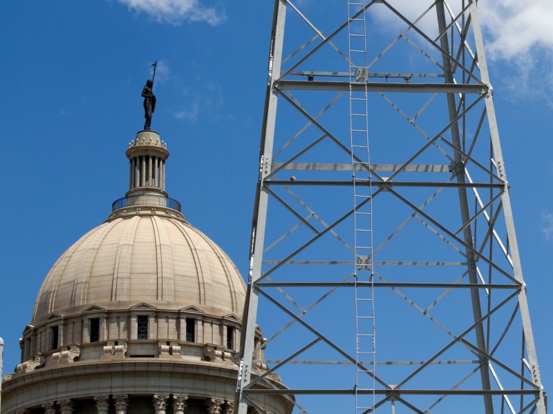 An oil derrick sits on the grounds of the Oklahoma Capitol.